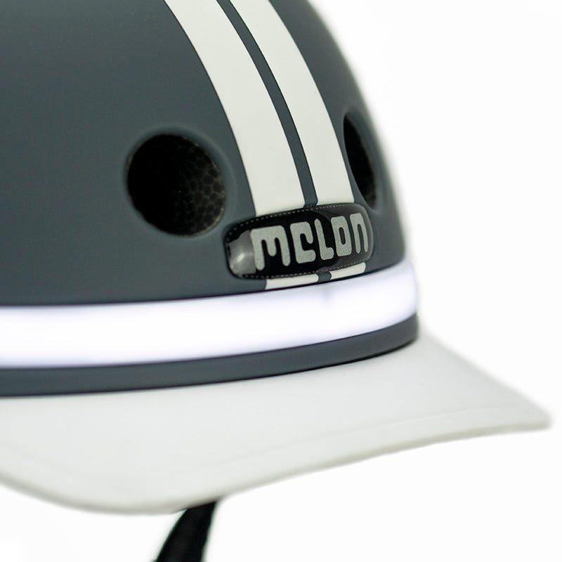 Melon E-Series Highway casca bicicleta M-L gri cu lumini LED